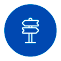 Location Icône circulaire bleue représentant un panneau indicateur blanc sur lequel figurent deux flèches directionnelles au sommet d'un poteau unique.
