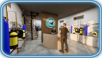 Komodo Reception area of Legend Diving shop with a circular desk, staff helping a customer, and diving tanks and gear displayed on racks.